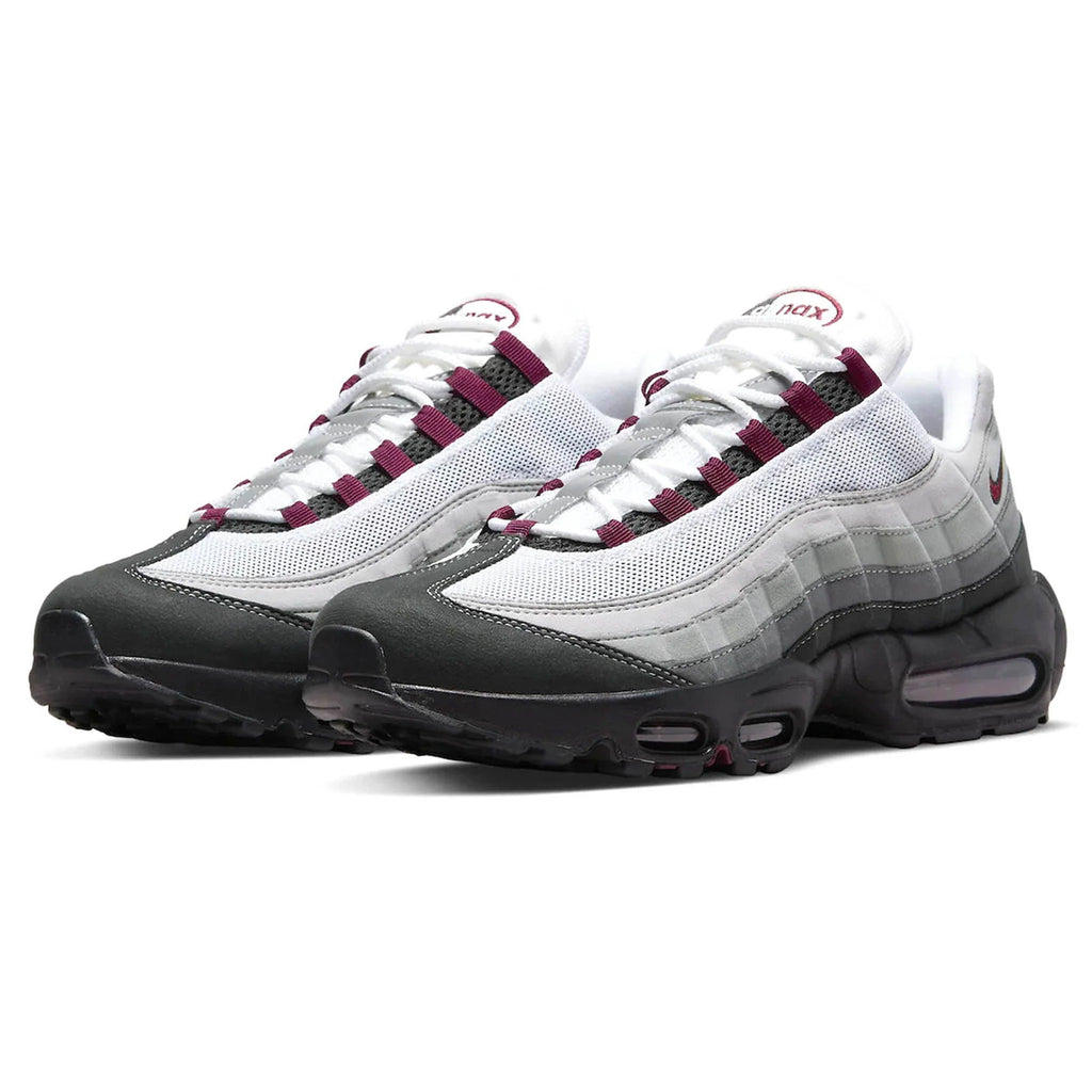 Stylish white, grey, and maroon sneakers from Lloyds Jones Footwear on a white background.